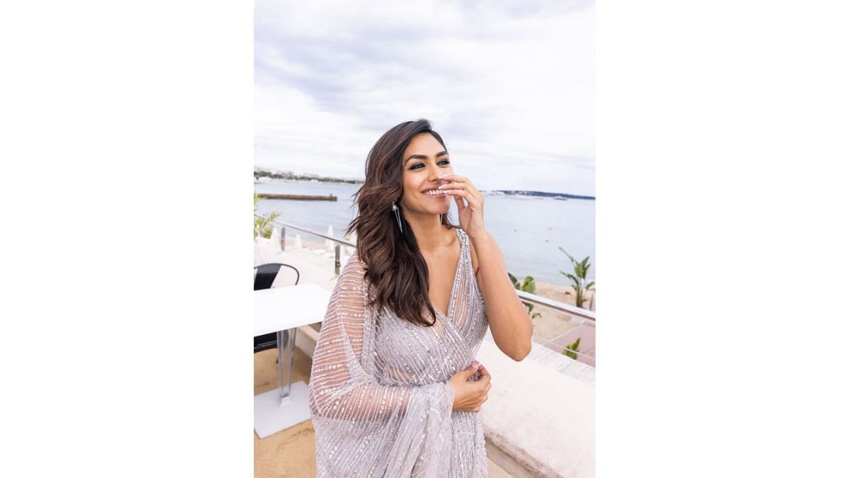 Mrunal set the stom on the internet by sharing pictures from her first red carpet look along with a caption,