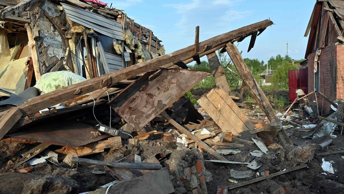 A photograph shows a destroyed house after a missile strike in Tsirkuny village, Kharkiv region on May 18, 2023. Credit: AFP Photo