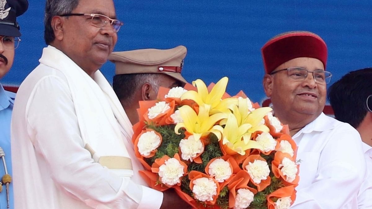 Governor Thaawarchand Gehlot administered the oath of office and secrecy to the Chief Minister and his Cabinet at Sree Kanteerava Stadium, where Siddaramaiah had taken oath in 2013, when he became Chief Minister for the first time. Credit: IANS