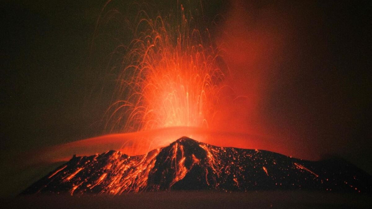 Incandescent materials, ash and smoke are spewed from the Popocatepetl volcano in San Nicolas de los Ranchos, Puebla state, Mexico on May 20, 2023. Credit: AFP Photo