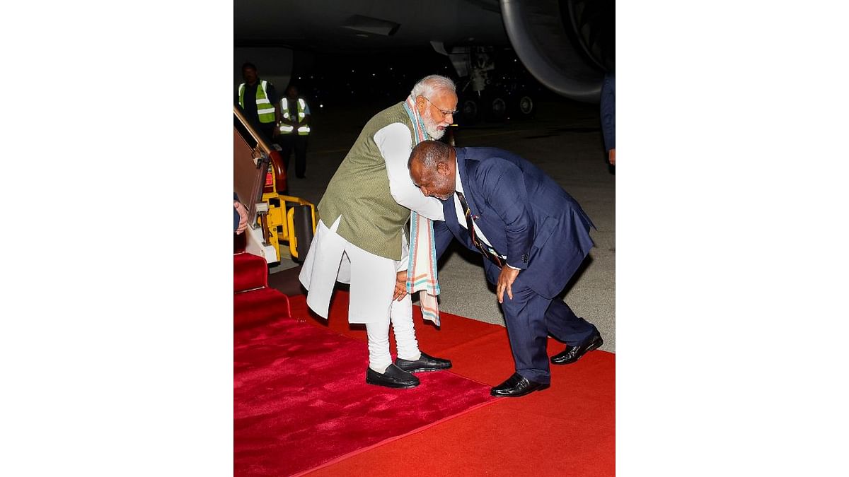 PM Modi's counterpart James Marape welcomed him by touching his feet. This gesture by PM Marape made headlines with netizens applauding and sharing the visuals on social media. Credit: PTI Photo