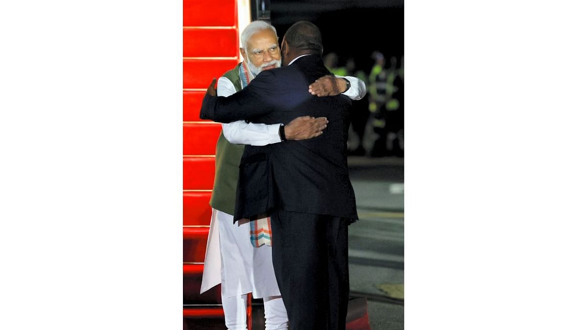 Prime Minister Narendra Modi and Prime Minister of Papua New Guinea James Marape share a warm hug upon the former's arrival in Papua New Guinea. Credit: Twitter/@narendramodi
