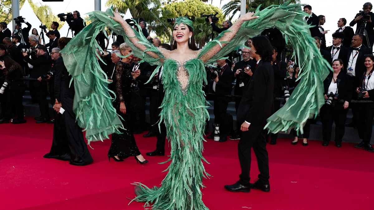Urvashi was seen donning a green-hued feather and sequin embellished gown from the ace designer Zaid Nakad's Spring Summer 2023 Couture. Credit: Reuters Photo