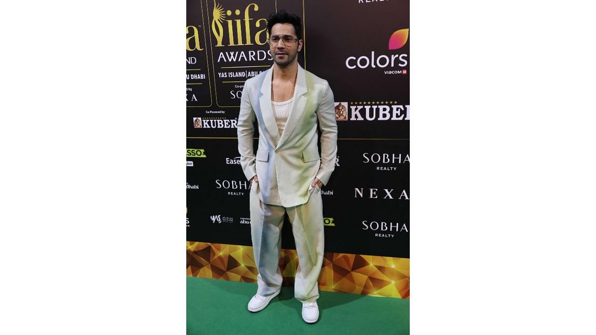 Varun Dhawan poses for the cameras in his arrival for IIFA rocks. Credit: AFP Photo