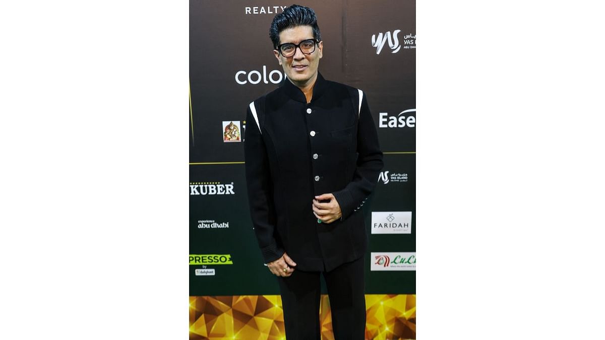 Ace designer Manish Malhotra looked dapper in black. Credit: AFP Photo