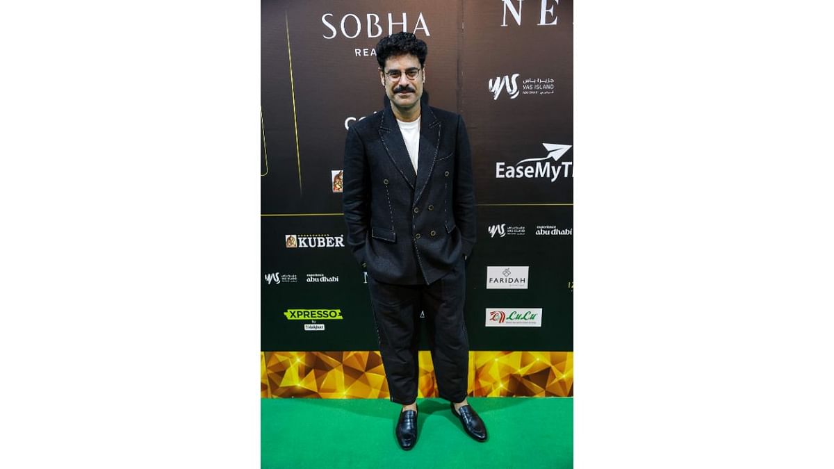 Sikandar Kher poses for the cameras as he walks the green carpet for the IIFA Rocks event. Credit: AFP Photo