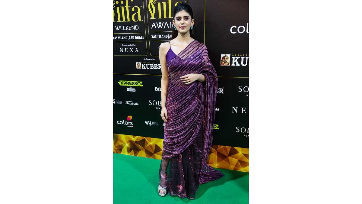 Actress Sanjana Sanghi wore an ethnic saree dress to IIFA rocks. Credit: AFP Photo