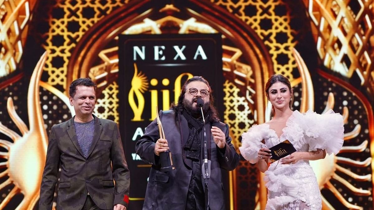 Arijit Singh won best playback singer (male) for the song 'Kesariya' from 'Brahmastra Part One: Shiva'. Music composer Pritam received the award on his behalf. Credit: IIFA