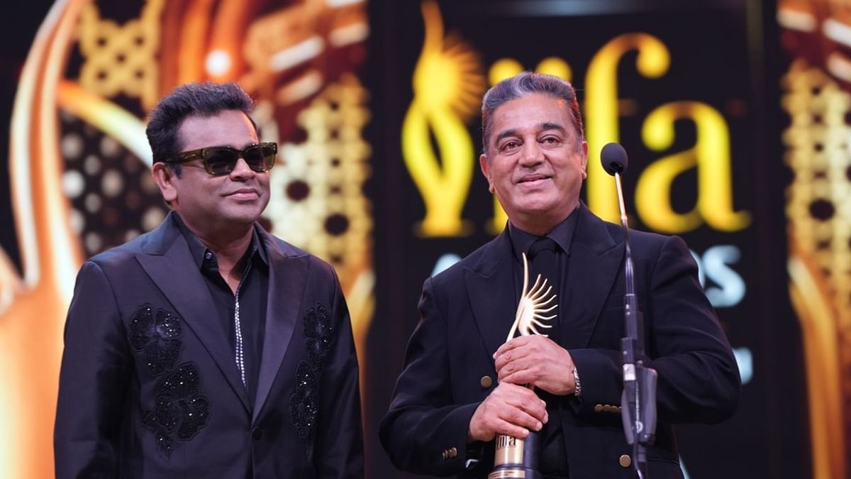 Music maestro A R Rahman felicitated cinema icon Kamal Haasan with the Outstanding Achievement in Indian Cinema honour at the IIFA Awards. Credit: IIFA