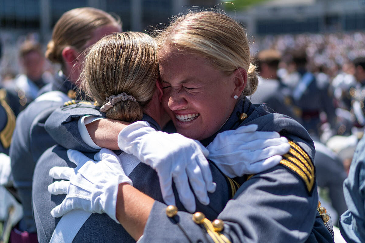 Graduation cadets congratulate each other at the end of the 2023 graduation ceremony at the United States Military Academy (USMA), at Michie Stadium in West Point. Credit: Reuters Photo