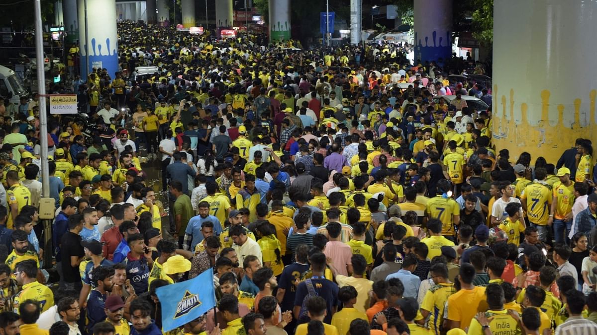 Thousands of CSK fans are seen outside the Narendra Modi Stadium in Ahmedabad. Credit: AFP Photo
