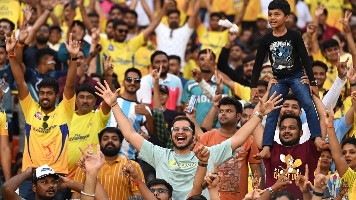 Chennai Super Kings' fans chant 'Dhoni Dhoni' during the IPL 2023 final match between Gujarat Titans and Chennai Super Kings, in Ahmedabad. Credit: PTI Photo