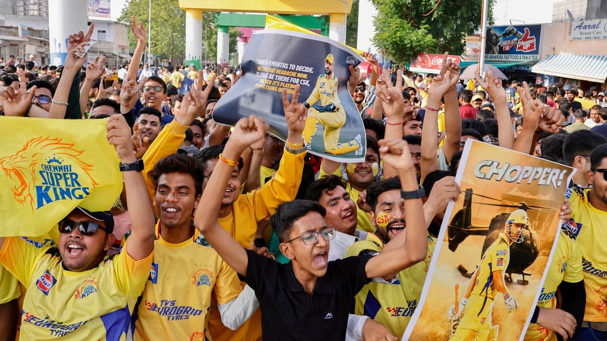 CSK fans arrive in large number at the Narendra Modi Stadium ahead of Indian Premier League’s (IPL) final match between Chennai Super Kings and Gujarat Titans, in Ahmedabad. Credit: PTI Photo