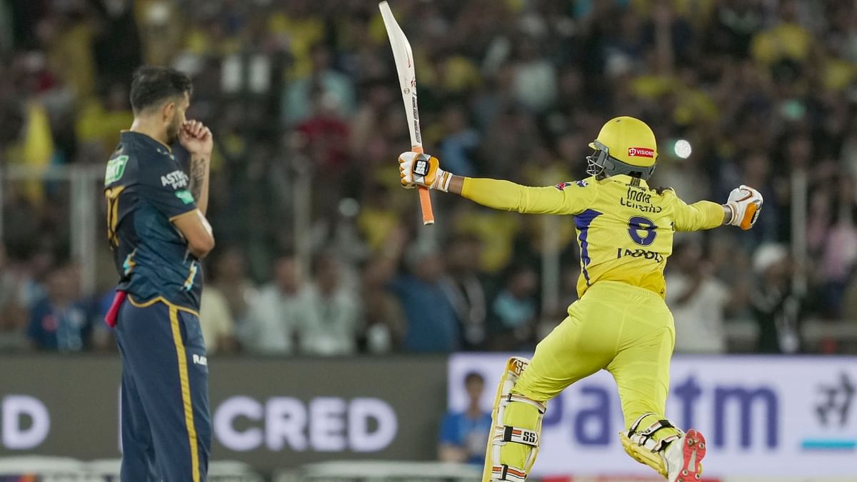 Star all-rounder Ravindra Jadeja turned the tables on GT's best death bowler, Mohit Sharma (3/36), smacking him for a six and a four on the last two balls to seal the deal for his side. Credit: PTI Photo