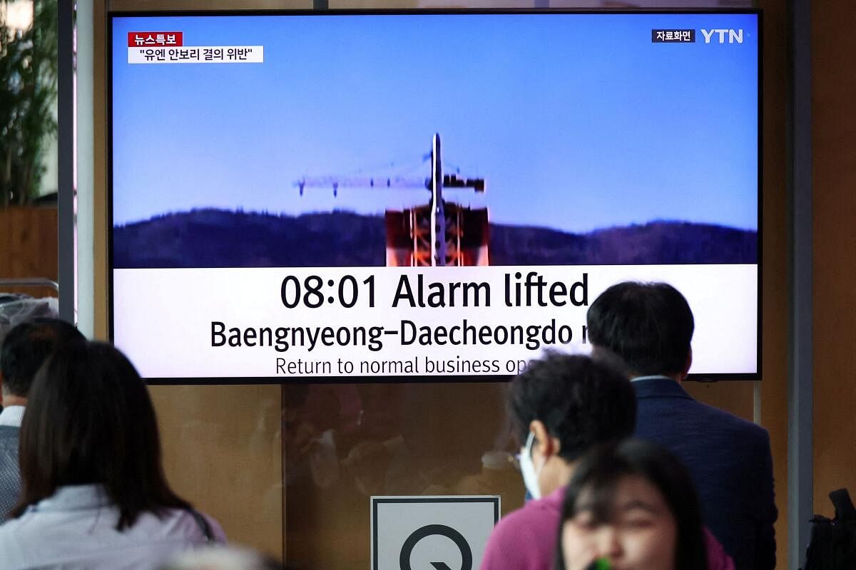 People watch a TV broadcasting a news report on North Korea firing what it called a space satellite toward the south, in Seoul, South Korea, May 31. Credit: Reuters Photo