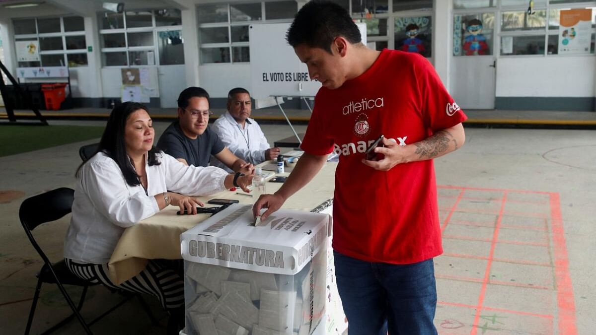 A man casts his vote at a polling station during the election day for governor of the State of Mexico, in Toluca, Mexico June 4, 2023. Credit: Reuters Photo