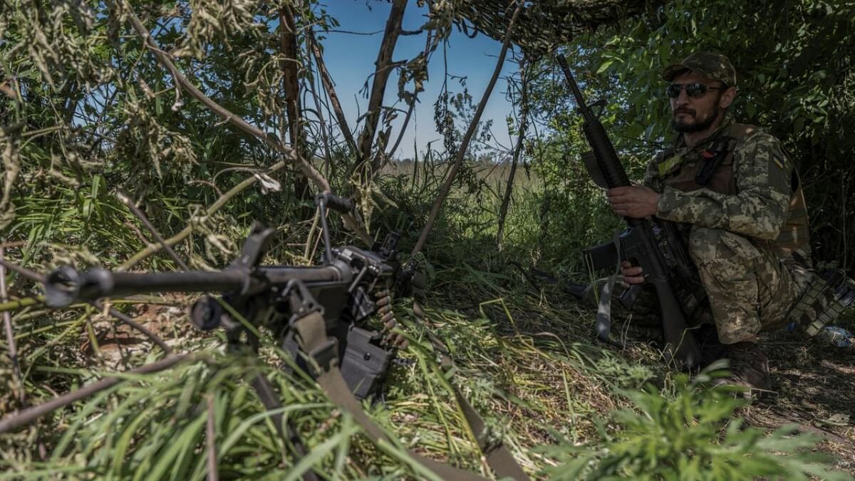 A Ukrainian serviceman looks on near the Ukraine-Russia border, amid Russia's attack on Ukraine, in Kharkiv region, Ukraine, June 4, 2023.  Credit: Reuters Photo