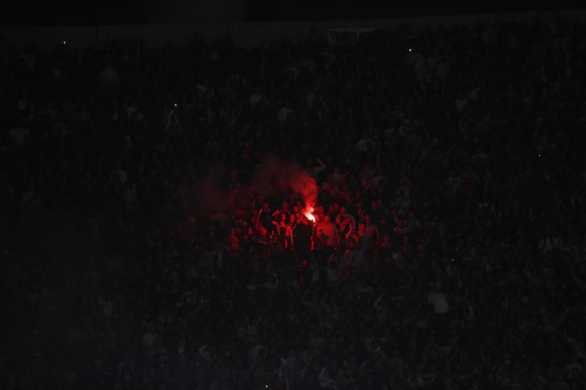 Fans with flares during River Plate v Fluminense. Credit: Reuters Photo
