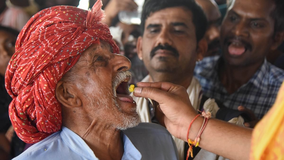 The event is organised by the Bathini Goud family claiming that the prasadam can cure asthma. A herbal paste, which contains a live Murrel fish, is given to thousands of people who believe it has medicinal properties and can cure respiratory ailments like asthma and bronchitis. Credit: PTI Photo