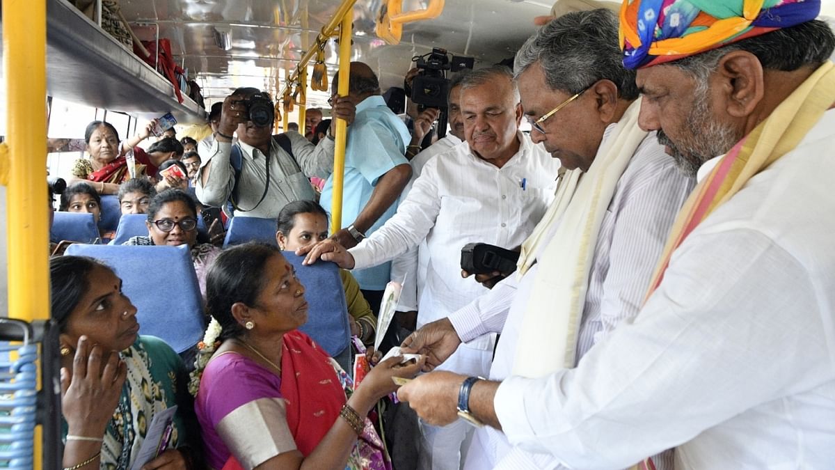 Karnataka Chief Minister Siddaramaiah and Deputy Chief Minister D K Shivakumar launched free travel scheme for women in Karnataka State Road Transport Corporation (KSRTC) and Bengaluru Metropolitan Transport Corporation (BMTC). Credit: IANS Photo