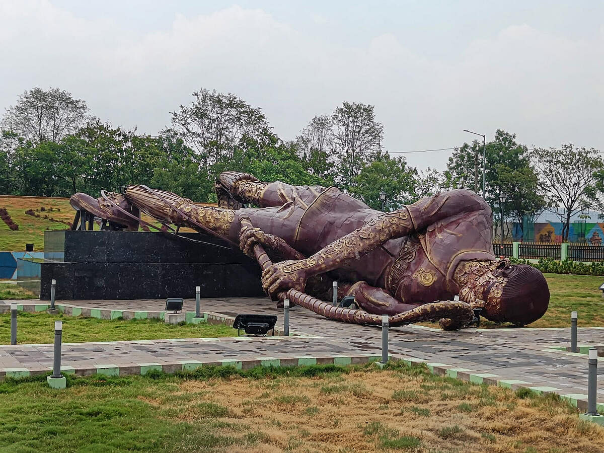 A 40-feet statue of a hockey player that was installed near Rourkela Airport during Men's Hockey World Cup 2023 crashes down due to Norwester winds and rains, in Rourkela. credit: PTI Photo
