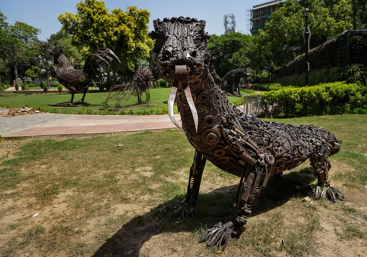 Sculptures of national birds and animals of the G20 countries made from scrap metal at a waste-to-art themed park setup ahead of the G20 Summit, at Kautilya Marg, in New Delhi. Credit: PTI Photo