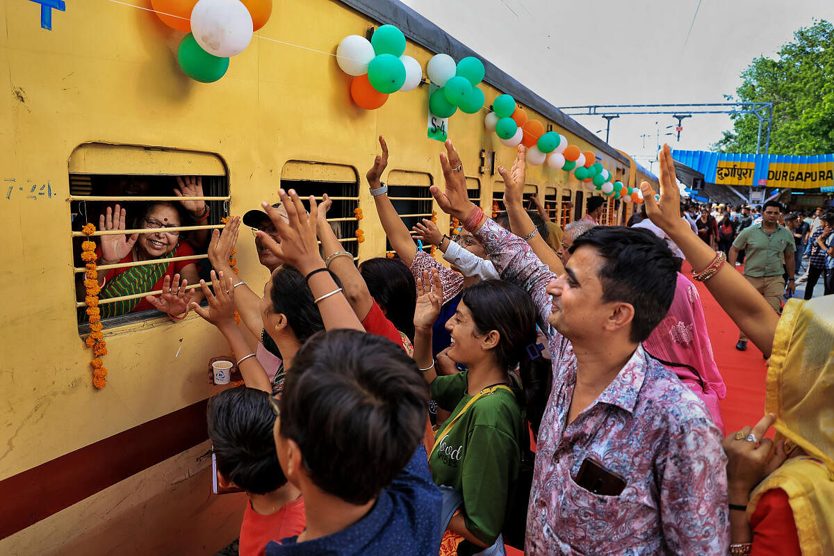 People see their senior citizen family members off before the latter’s departure under the state government’s 'Senior Citizen Pilgrimage Scheme 2023’, at Durgapura railway station, in Jaipur. Credit: PTI Photo