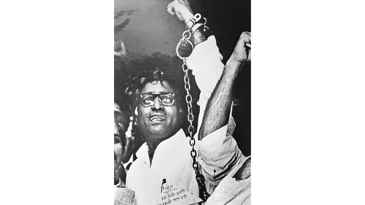 George Fernandes in shackles when he was  arrested in Calcutta on June 10, 1976 in the  Baroda Dynamite Case, almost a full year after  Indira Gandhi imposed Emergency on June 25,  1975. Deccan Herald maintained its independent  editorial stand during the Emergency.