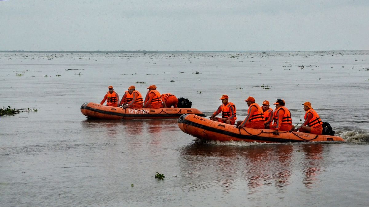 National Disaster Response Force (NDRF) personnel prepare and exercise for the upcoming flood season, on the banks of river Brahmaputra amidst rising water levels due to frequent rainfall, at Tezpur Jahaj Ghat, in Sonitpur. Credit: PTI Photo