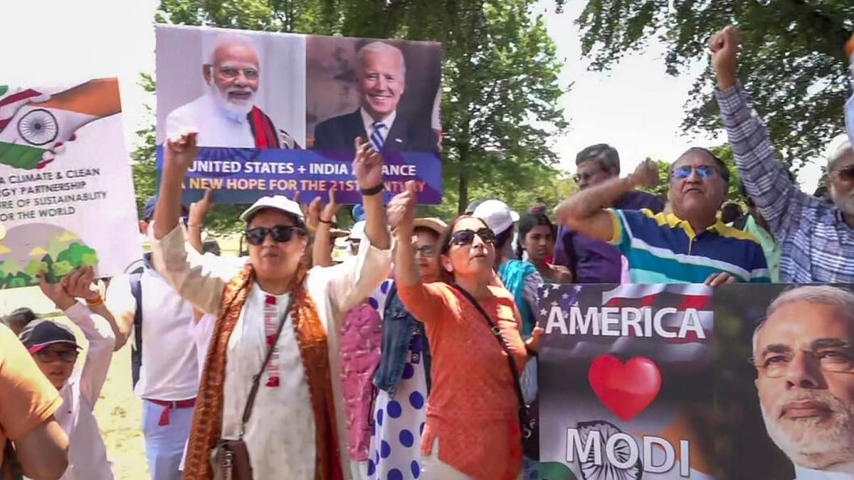 Indian-Americans raise slogans to send a message of welcome to Prime Minister Narendra Modi ahead of his state visit, in Washington, Sunday, June 18, 2023. Credit: PTI Photo