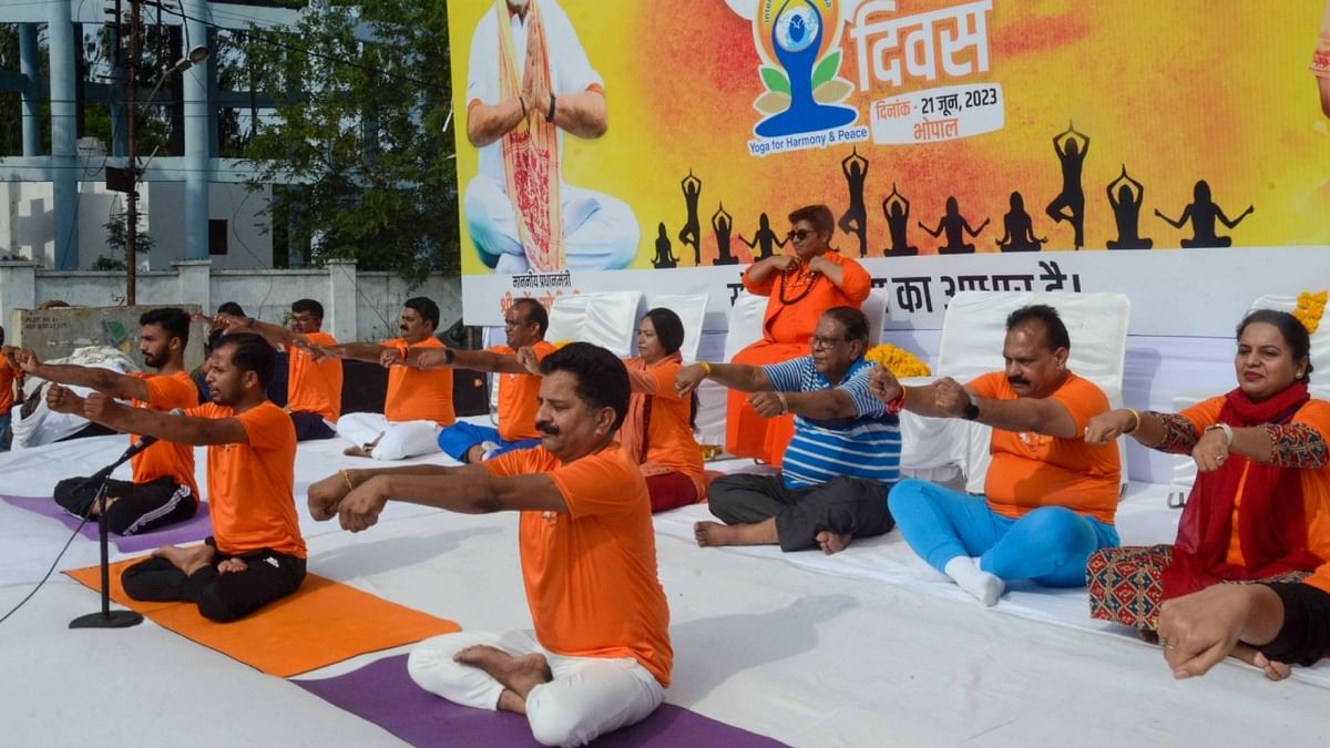 BJP MP Sadhvi Pragya Thakur performs yoga during a session on the International Day of Yoga, in Bhopal. Credit: IANS Photo