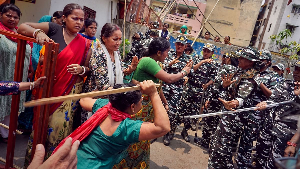 They chanted slogans and also participated in prayers at the temple after the encroachment drive was completed, police said. Credit: PTI Photo