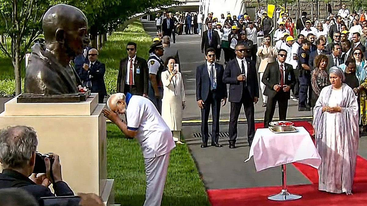 PM Modi, who is on his maiden state visit to the US, also paid respects to the bust of Mahatma Gandhi in the North Lawn of the UN headquarters at the beginning of the event. Credit: PTI Photo