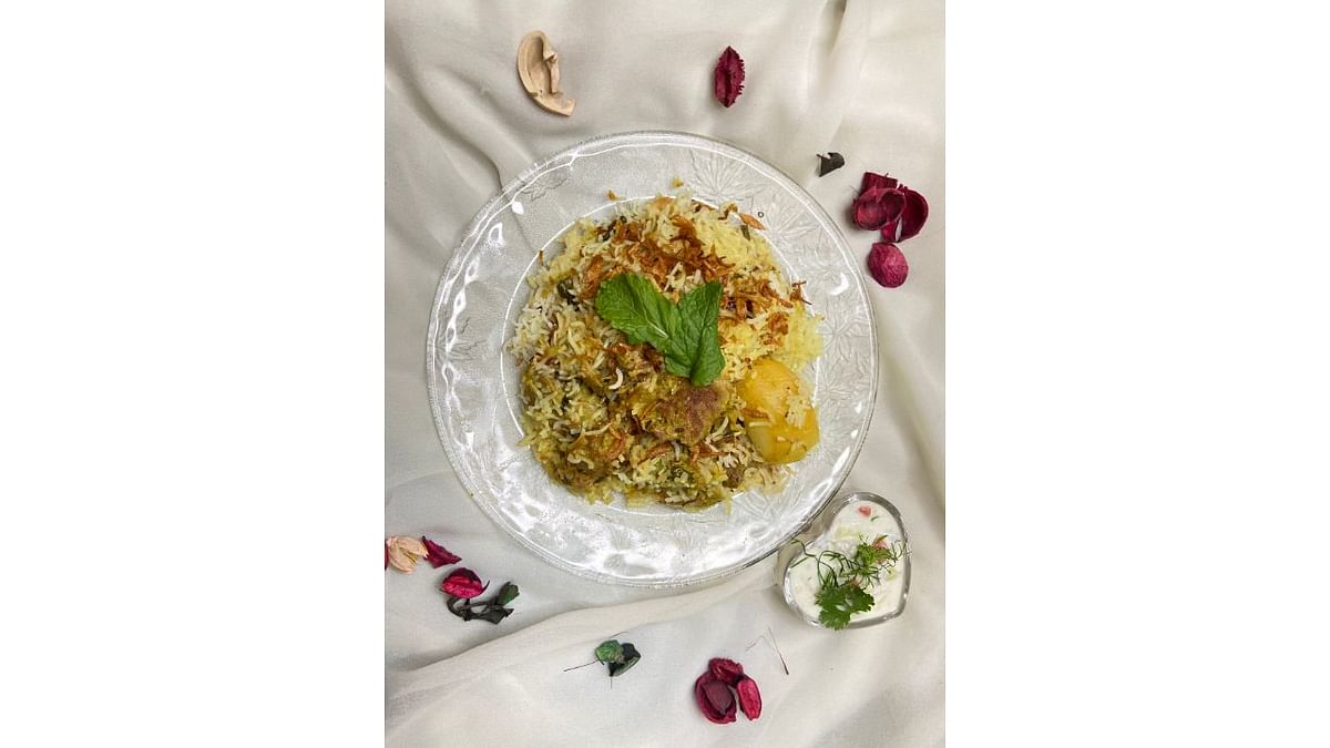 Ambur Biryani: Hailing from Tamil Nadu's Ambur, this biryani is a delightful one-pot meal with succulent pieces of meat cooked to perfection along with the aromatic jeera samba rice, mint leaves, coriander leaves and whole spices. Credit: DH Pool Photo