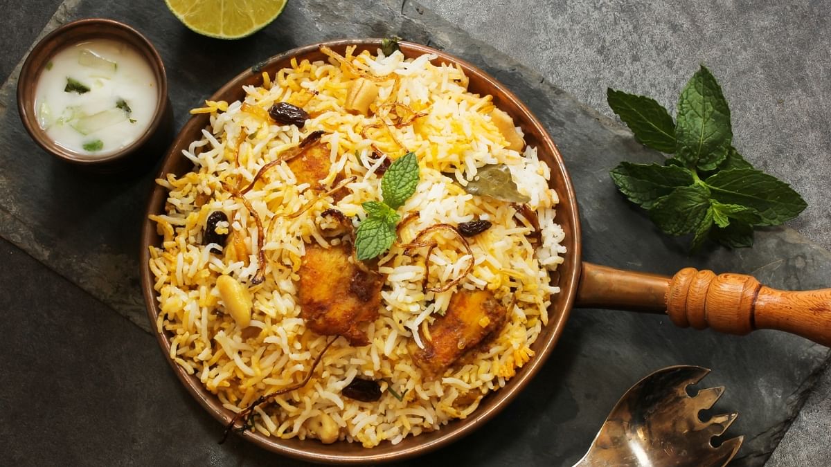 Awadhi Biryani: Also known as Lucknowi Biryani, this dish has a uniquely delicate flavor and rich fragrance and hails from Uttar Pradesh's Lucknow. It typically features tender meat, fragrant basmati rice, saffron, and a blend of spices like cardamom and cinnamon. Credit: Getty Images