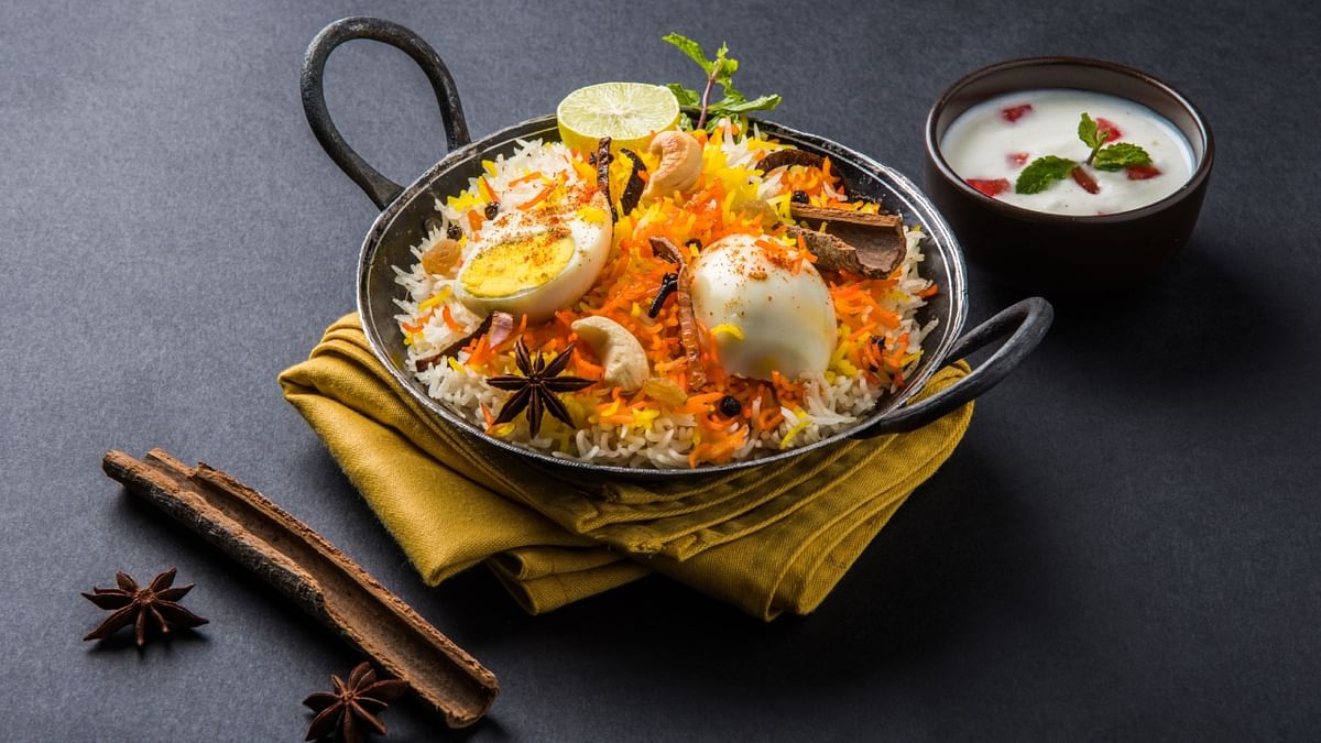 Kolkata Biryani: This biryani is a specialty of Kolkata, India, and has a distinct flavor influenced by Mughlai and Awadhi cuisines. It is prepared with basmati rice, meat or egg, potatoes, and a unique blend of spices, including a touch of sweetness. Credit: Getty Images