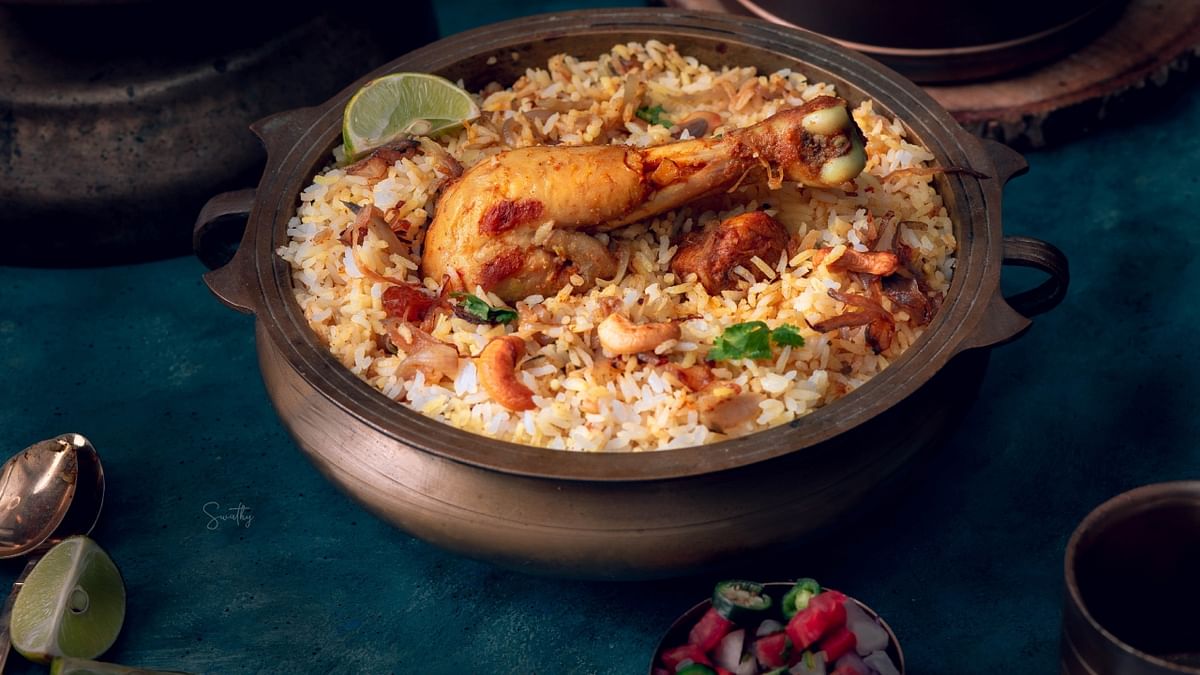 Malabar Biryani: Hailing from Kerala's Malabar, this biryani is known for its unique blend of flavors. It combines fragrant rice, meat (such as chicken, mutton, or fish), spices, coconut milk, and a touch of lemon, resulting in a delicious and aromatic dish. Credit: Getty Images