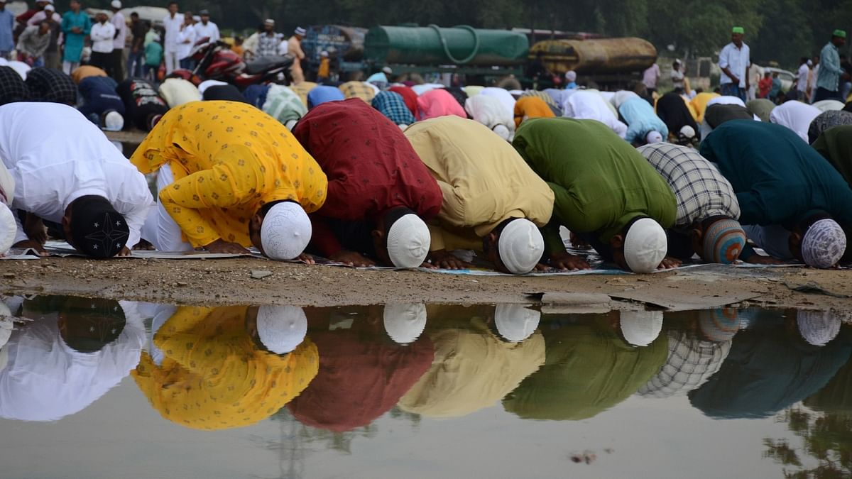 Muslims offer prayers on the occasion of Eid al-Adha festival at Leisure Valley ground in Gurugram. Credit: PTI Photo