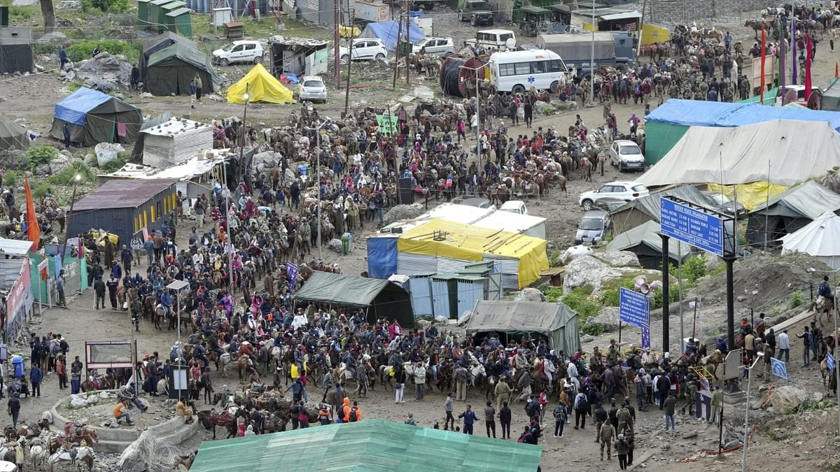 The annual Amarnath started with thousands of pilgrims heading out from the base camp to the cave shrine in the south Kashmir Himalayas on July 1. Credit: PTI Photo