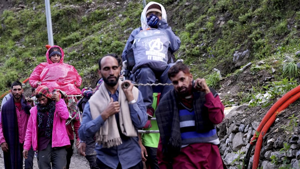 Pilgrims on their way to the holy cave shrine of Amarnath at Baltal in Ganderbal district of central Kashmir. Credit: PTI Photo