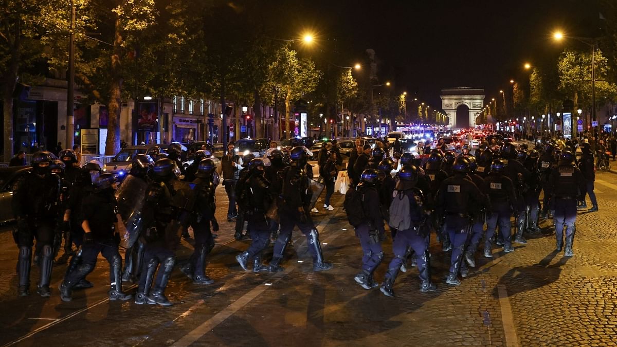 In a statement on Twitter early Sunday, Darmanin, the interior minister, said 427 people had been arrested overnight Saturday. On Friday night, more than 1,300 had been detained. He added that 45,000 police officers had been deployed across the country on Saturday evening, a number similar to the night before. Credit: Reuters photo