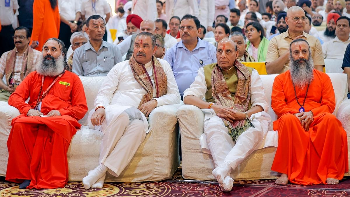 Defence Minister Rajnath Singh and Chairman of the National Commission for Scheduled Castes Vijay Sampla and others attended an event at Dera Divya Jyoti Jagriti Sansthan on the ocassion of 'Guru Purnima', in Jalandhar. Credit: PTI Photo