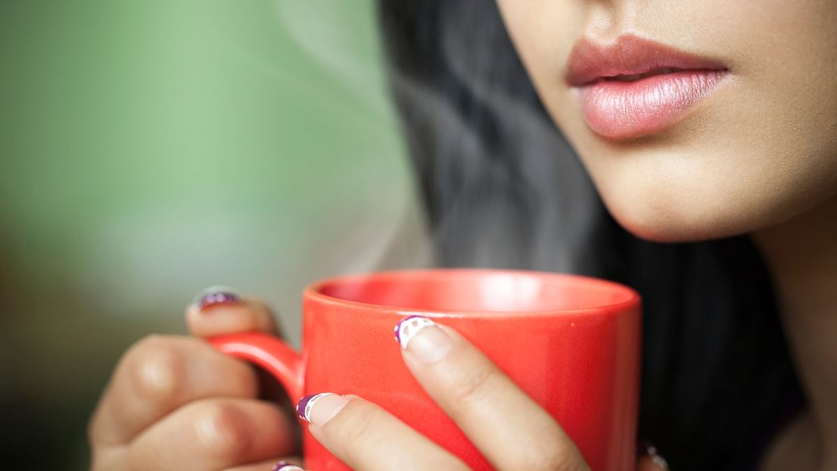 Warm beverages like hot chocolate, tea, or coffee can provide warmth and a cozy feeling while watching the rain. Add some spices like cinnamon or nutmeg for extra flavor. Credit: Getty Images