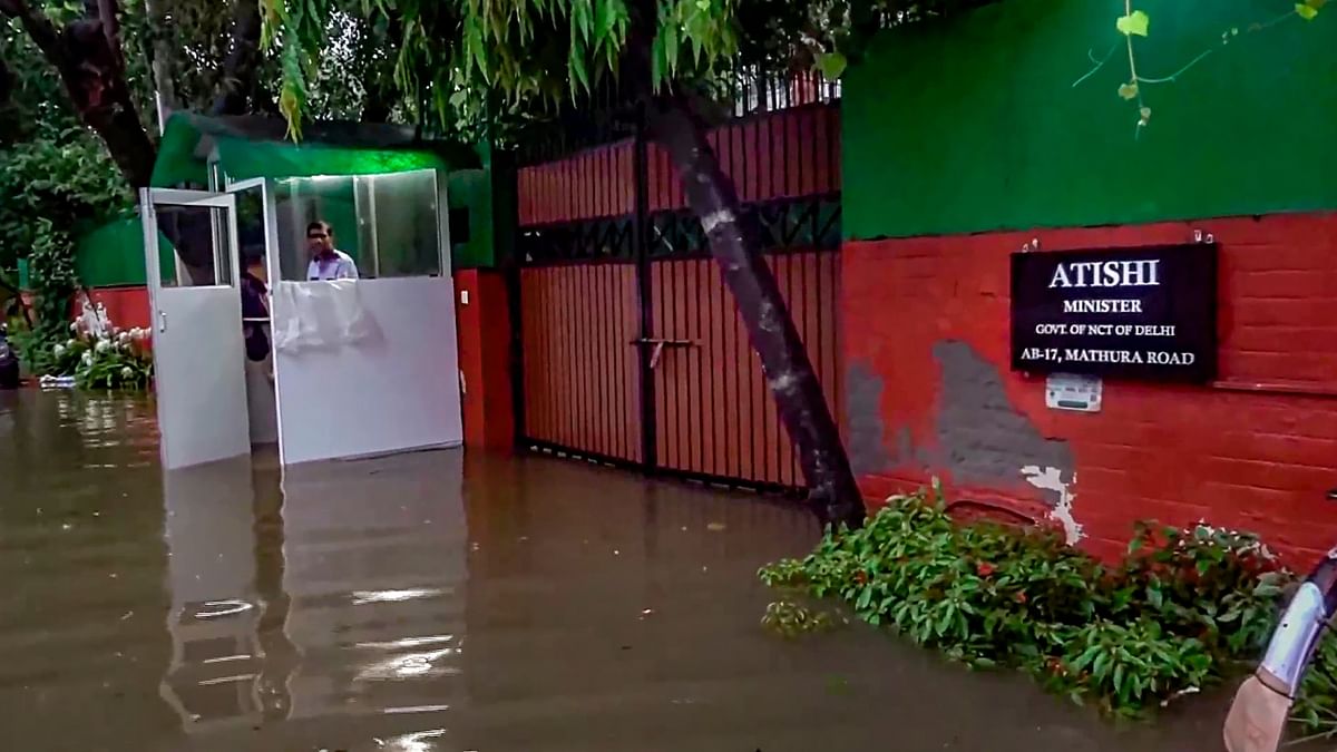 Waterlogging outside the residence of Delhi Minister Atishi after heavy monsoon rains, in New Delhi. Credit: PTI Photo