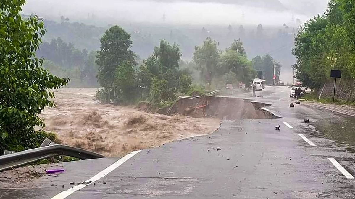 Manali-Chandigarh highway washed away due to flooding of the Beas River following heavy monsoon rains, in Manali. Credit: PTI Photo