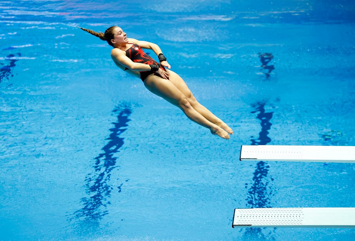 Canada's Mia Vallee in action during the women's 1m springboard preliminary at Fukuoka 2023 World Aquatics Championships. Credit: Reuters Photo