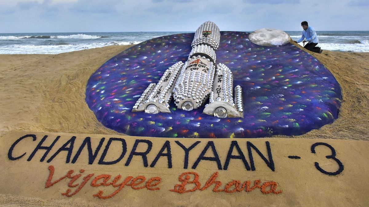 Artist Sudarsan Pattnaik creates a sand art to wish good luck to ISRO scientists ahead of ISRO's Chandrayaan-3 mission, in Puri. Credit: PTI Photo