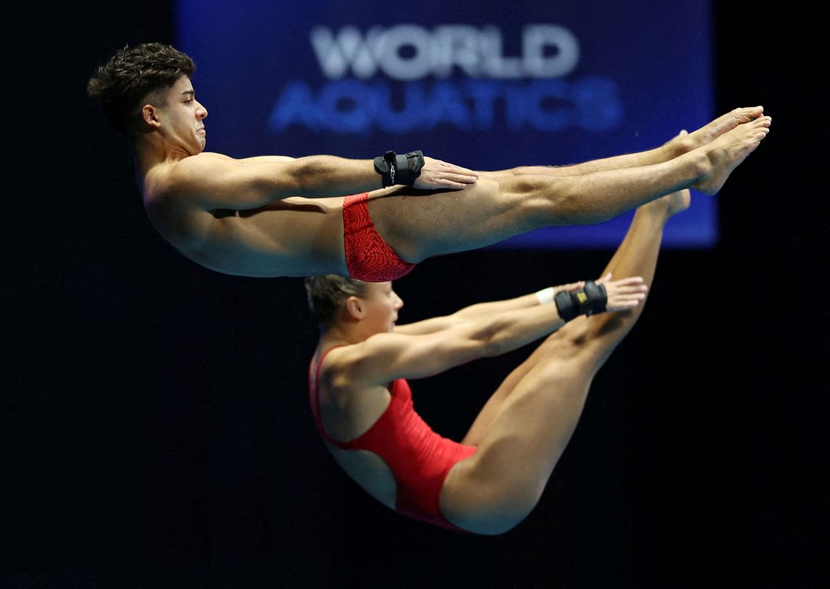 Puerto Rico's Maycey Adrianne Vieta and Emanuel Vazquez in action during the mixed 10m synchronised final during Fukuoka 2023 World Aquatics Championships. Credit: Reuters Photo