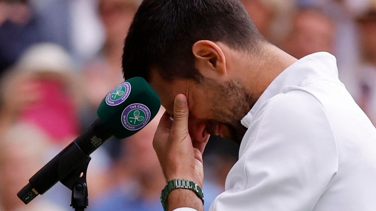 Novak Djokovic was in tears after spotting his son Stefan watching his post-match interview. Credit: Reuters Photo