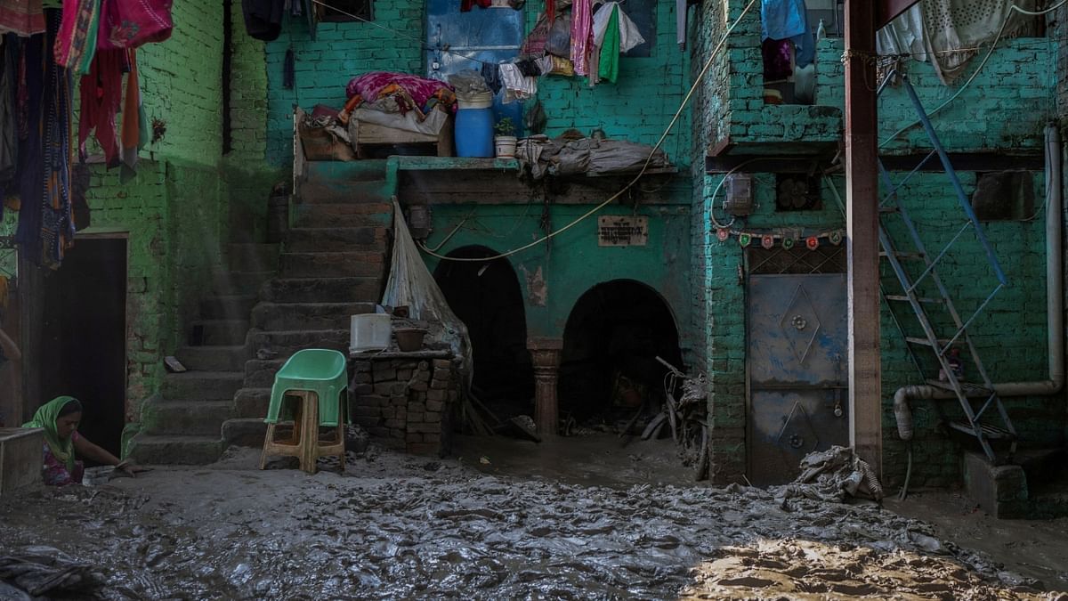 A house filled with mud is seen as the flood water started receding from a residential area that was flooded by the overflowing of the river Yamuna following heavy rains in New Delhi. Credit: Reuters Photo